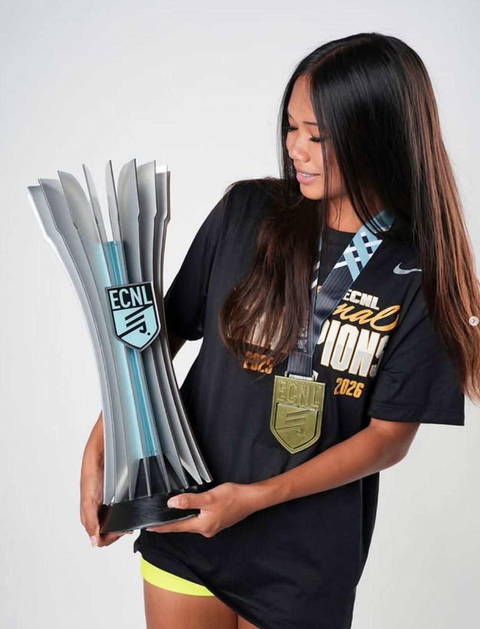 With the trophy and her medal: 2026 ECNL U15 National Champion