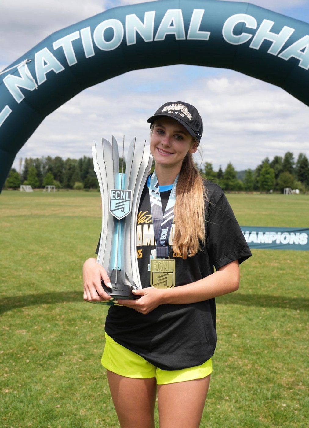 With the trophy under the ECNL National Champions arch, 2026
