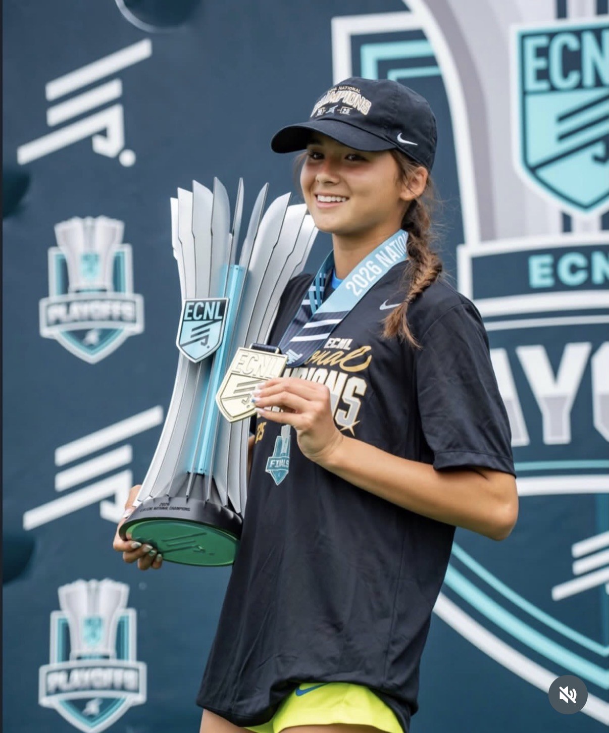 With the trophy and her medal: 2026 ECNL U15 National Champion